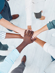 Image showing Diversity, partnership collaboration and hands of business people stack in community support, trust and solidarity. Mission teamwork, team building meeting and businessman and women together top view