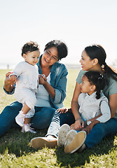 Image showing Family, love and park, women and children outdoor on a field of grass, picnic and quality time together in the sun. Mother, grandmother and girl with baby, generations have fun in nature and bonding.