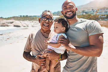 Image showing Baby, beach and family with a father, grandfather and son on the sand during a summer vacation together. Children, travel and love with a man, boy and senior parent by the sea or ocean for holiday