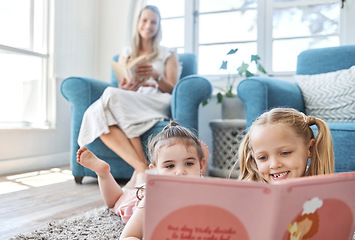 Image showing Development, mother and girl children reading with book, smile and happy on floor, together and home. Female, lady and daughters doing childcare, growth and fun, laugh or education for learning