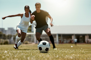 Image showing Friends, soccer player and soccer training game on football field for fitness workout on grass outdoor football pitch for body or cardiovascular health. People, soccer ball and summer run in Brazil