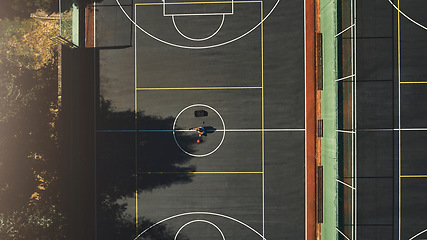 Image showing Basketball, sport and fitness, basketball court and game, public sports arena and exercise motivation top view. Athlete, workout and training, basketball player and competition with high angle.