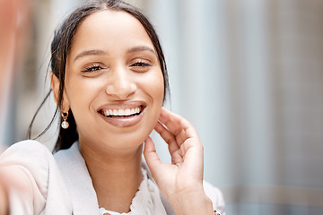 Image showing Face, smile and selfie with a happy black woman in the city feeling carefree with mockup. Beauty, head and portrait with an attractive young female taking a photograph or picture alone outside