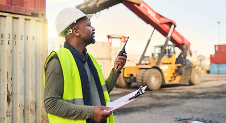 Image showing Black man engineer, checklist and container manager planning distribution, shipping and delivery logistics. African supply chain stock and cargo worker on walkie talkie for freight industry business