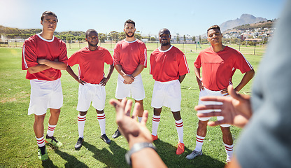 Image showing Coaching, football and sports with team on field for training, motivation and fitness together. Health, teamwork and planning with soccer player athlete learning strategy, communication and support