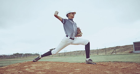 Image showing Sports game, baseball field and man throw ball in competition, practice match or pitcher training workout. Softball player, dirt pitch or athlete doing outdoor fitness, exercise or pitching challenge