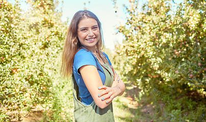 Image showing Happy, farm and portrait of woman farmer with trees in sustainable, agriculture and agro environment. Sustainability, happiness and eco friendly girl farming in countryside during summer in Australia