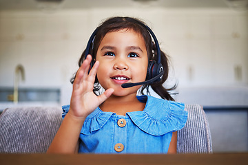 Image showing Girl, education headset or waving in distance learning, remote study or lockdown homeschool support. Smile, happy or greeting student on video call, kids studying webinar or children lesson in house