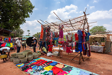 Image showing Street market in Mandoto city, with vendors and ordinary people shopping and socializing. This image portrays the local lifestyle and economy of Madagascar.