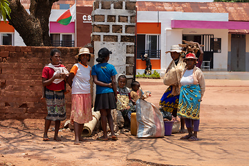 Image showing Malagasy woman resting on the street in shadow. Mandoto, Madagascar