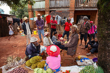 Image showing Street market in Mandoto city, with vendors and ordinary people shopping and socializing. This image portrays the local lifestyle and economy of Madagascar.