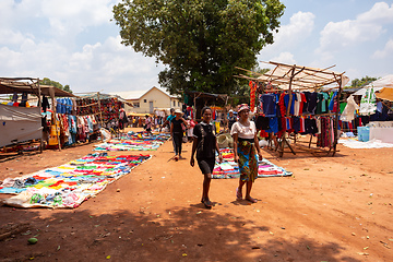 Image showing Street market in Mandoto city, with vendors and ordinary people shopping and socializing. This image portrays the local lifestyle and economy of Madagascar.