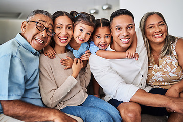 Image showing Big family, smile and happiness of a mother, father and kids with grandparents and a hug at a house. Happy dad, children and elderly people feeling love and care hugging in a home with calm smiling