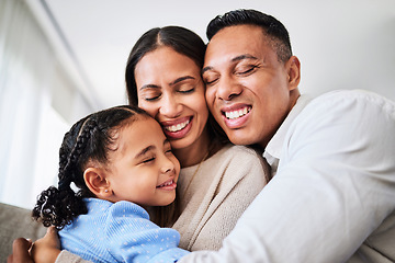 Image showing Family hug, happy love and parents with smile for child on sofa in home, care for kid and excited about weekend together in the living room. Girl hugging dad and mom while relax on couch in a lounge