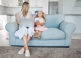 Image showing Mother, girl child and digital device happy, learn and smile for bonding, embrace and talking together in living room on couch. Laptop, smartphone and mama with daughter browse online and home school