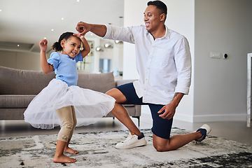 Image showing Black father, girl and being happy, dance and have fun together in living room. Dad, young female child and daughter doing quality time, dancing and in tutu dress for play, celebration and happiness.