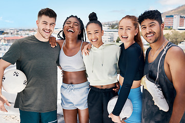 Image showing Soccer team, sports diversity or fitness friends on city building rooftop in training game, exercise match or workout. Portrait, happy smile or football players, men or women and teamwork soccer ball