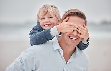 Image showing Father, child and hands on eyes in piggyback for playful fun, happiness or bonding together in the outdoors. Portrait smile of happy dad and kid playing in joy for back ride, free time and moments