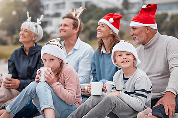 Image showing Happy, big family and relax for Christmas holiday, bonding and quality time together in the outdoors. Parents, grandparents and kids with drink in family celebration for December, festive or new year