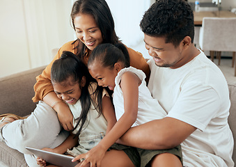 Image showing Tablet, relax and Asian family with children on sofa, watching a movie online together. Mom, dad and girls bond and playing at home using digital notebook for educational games, internet and videos