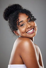 Image showing Skincare, beauty and cosmetics for black woman with perfect smile, dermatology and wellness routine against studio background. Jamaica girl portrait for wellness, health and facial for skin that glow