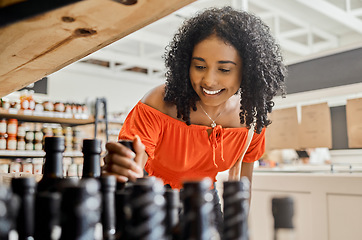 Image showing Woman in supermarket, groceries and sustainability, shopping food to support eco friendly local small business. Vegan choice grocery store with low carbon footprint and sustainable healthy lifestyle.