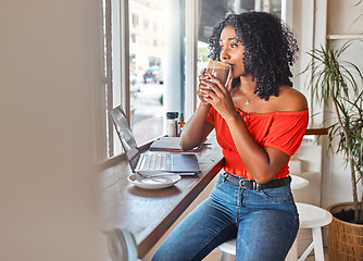 Image showing Coffee shop, thinking and black woman drinking her coffee and looking out window. Student working with laptop in cafe, taking a break to drink hot chocolate, think and brainstorm ideas for project