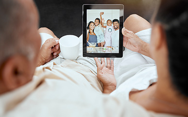 Image showing Digital tablet, video call and family relax on sofa with grandparents talking to kids in kitchen, happy, smile and excited. Happy family, living room and online call with children and senior couple