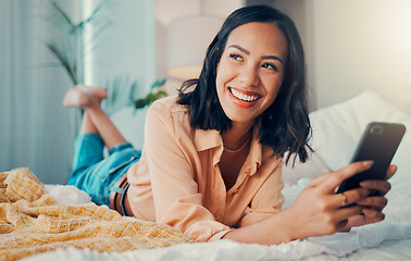 Image showing Happy woman, funny social media phone and thinking of online dating profile notification in bedroom in Spain. Young smile female relax at home, smartphone connection and 5g mobile network technology