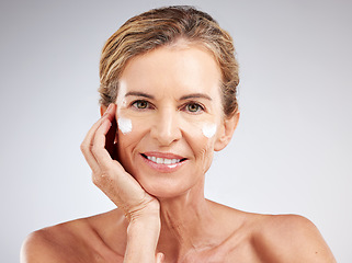 Image showing Skincare, anti aging cream and senior woman with luxury cosmetics product for beauty, wellness or self care. Happy, smile and face portrait of elderly person with natural spa lotion or facial makeup