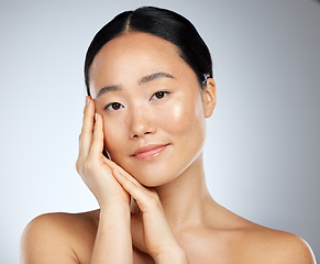 Image showing Beauty brand, skincare and dermatology treatment with woman using asian product routine for clean and healthy face and skin. Portrait of happy female model feeling luxury cosmetics results on body