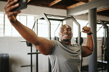 Image showing Phone, gym and selfie of black man, exercise and fitness with strong, muscular and smile bodybuilder. Happy instructor with picture, motivated and ready for a good training workout in a health centre