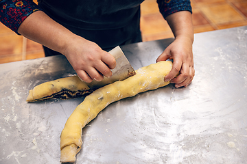 Image showing Making swirl brioche with poppy seeds