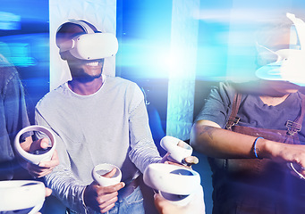 Image showing Virtual reality, metaverse and future with a black man gamer and friends playing online with a remote and goggles. VR, internet and technology with a male group gaming or having fun together at home