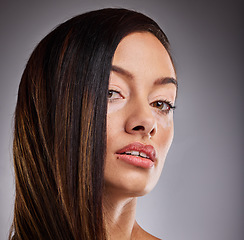 Image showing Skincare. beauty and vitiligo woman with cosmetics on face against studio background. Portrait of a young, pigmentation and cosmetic model with facial makeup, luxury dermatology and wellness or care