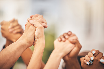 Image showing Diversity, community collaboration and holding hands in air strong together or racial empowerment march. Peace protest, trust teamwork and friendship help or friends, group or support human rights