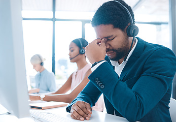 Image showing Stress, headache and call center with a man consultant suffering from pain or tension while working in customer service. Contact us, compliance and mental health with a male consulting on a headset