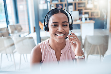 Image showing Telemarketing, customer support consultant and receptionist in call center with a headset. Happy, expert and contact us professional woman employee working in ecommerce or customer service company.