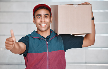 Image showing Thumbs up, success and courier with a delivery, box or ecommerce stock at a house. Portrait of a happy young man with a thank you, trust and smile for working in logistics service with cargo