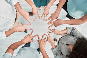Image showing Business people, hands and peace in support above for trust, unity or teamwork for company goals at the office. Hand of group in corporate solidarity, partnership and star symbol with fingers at work