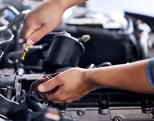 Image showing Closeup, car and engineer with tools for maintenance, repair and fixing in workshop at job. Hands, mechanic or working on motor, engine or vehicle in garage, workplace or shop for service in industry