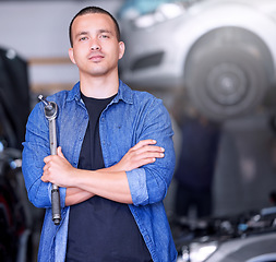 Image showing Success, small business and mechanic in workshop with car at startup. Working, maintenance and quality assurance for car insurance, man or engineer in auto repair service garage with growth mission.