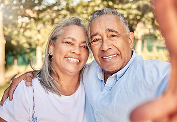 Image showing Selfie, portrait and senior couple in a park for love, care and happiness during retirement together. Happy, smile and elderly man and woman with a photo in nature, garden or environment in summer