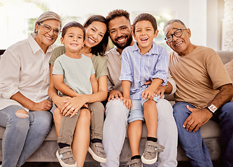 Image showing Happy, big family and smile on home living room sofa spending quality time bonding, love and relax together. Portrait of parents, grandparents and men and women with children smiling with happiness