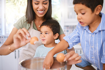 Image showing Mother, boy and children with egg for boiling, cooking and learning together in kitchen at house while on holiday. Mom, kids and food for eggs, education and teaching for breakfast, lunch or dinner