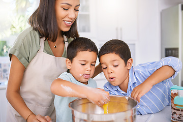 Image showing Learning, cooking and mom teaching boys how to bake in home kitchen. Education, support and happy mother spending time together with kids, bonding and baking delicious food, egg and flour recipes.