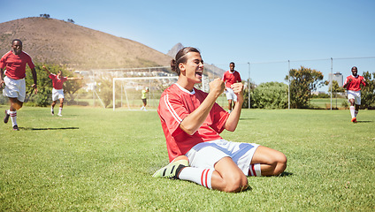 Image showing Soccer player, cheering and winner fist in game success, community match or energy workout training. Smile, happy and celebration for football player, men or sports friends on competition grass field