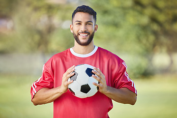 Image showing Sports man, soccer player and soccer field training with a soccer ball, happy and relax before fitness workout. Football, football player and sport portrait of excited player ready for game