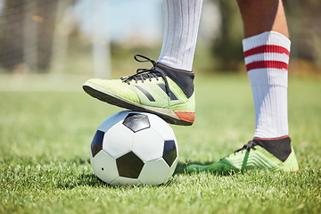 Image showing Soccer ball, soccer player shoes and foot on field to kick off, competition games and sports training on stadium grass pitch. Football player feet, man athlete action and power to score goals on turf