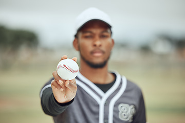 Image showing Baseball in hand, baseball player and athlete on field training for sports competition. Young black fitness man, health motivation and softball pitcher catch at stadium with bokeh background outdoors
